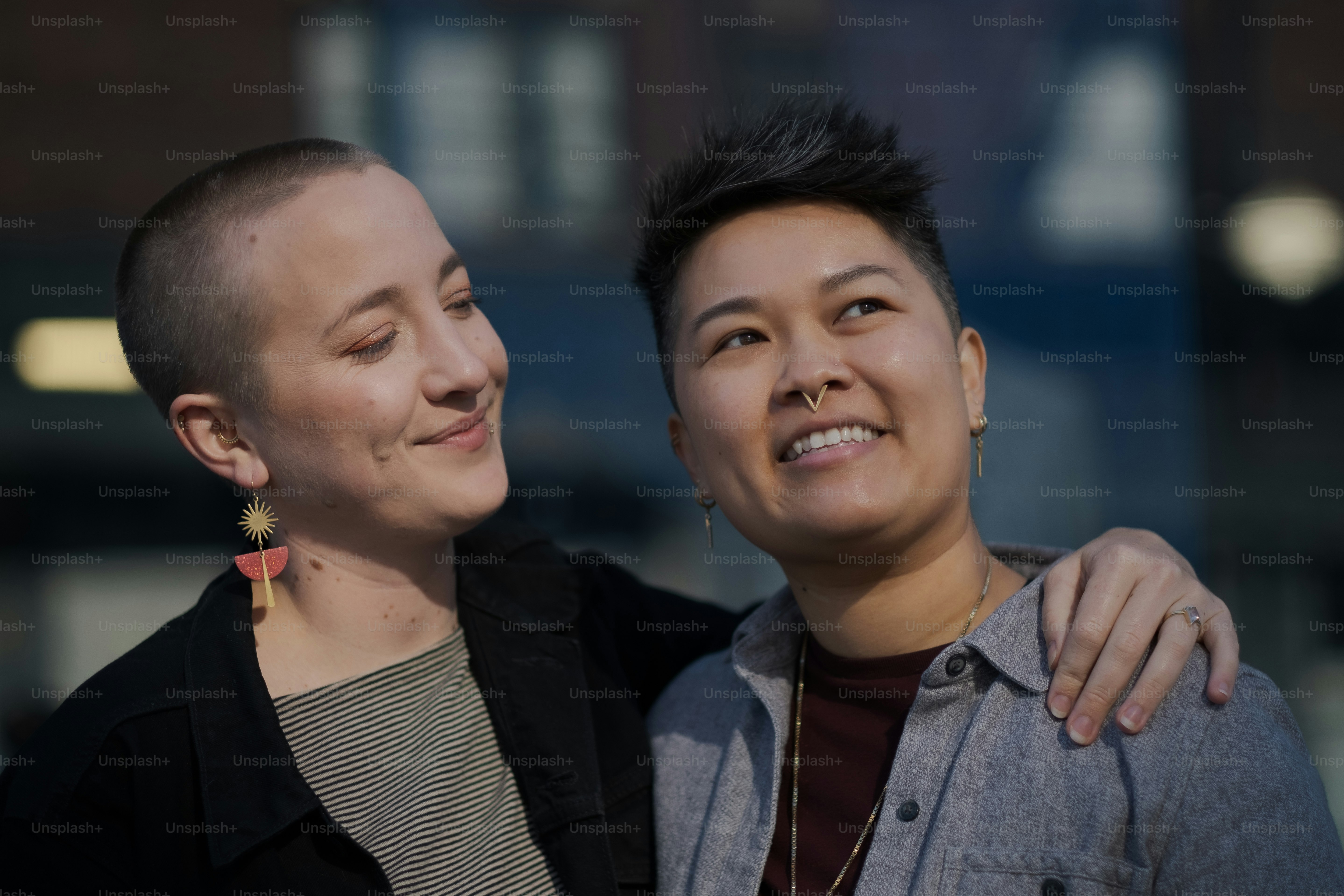 a couple of women standing next to each other