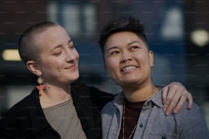 a couple of women standing next to each other