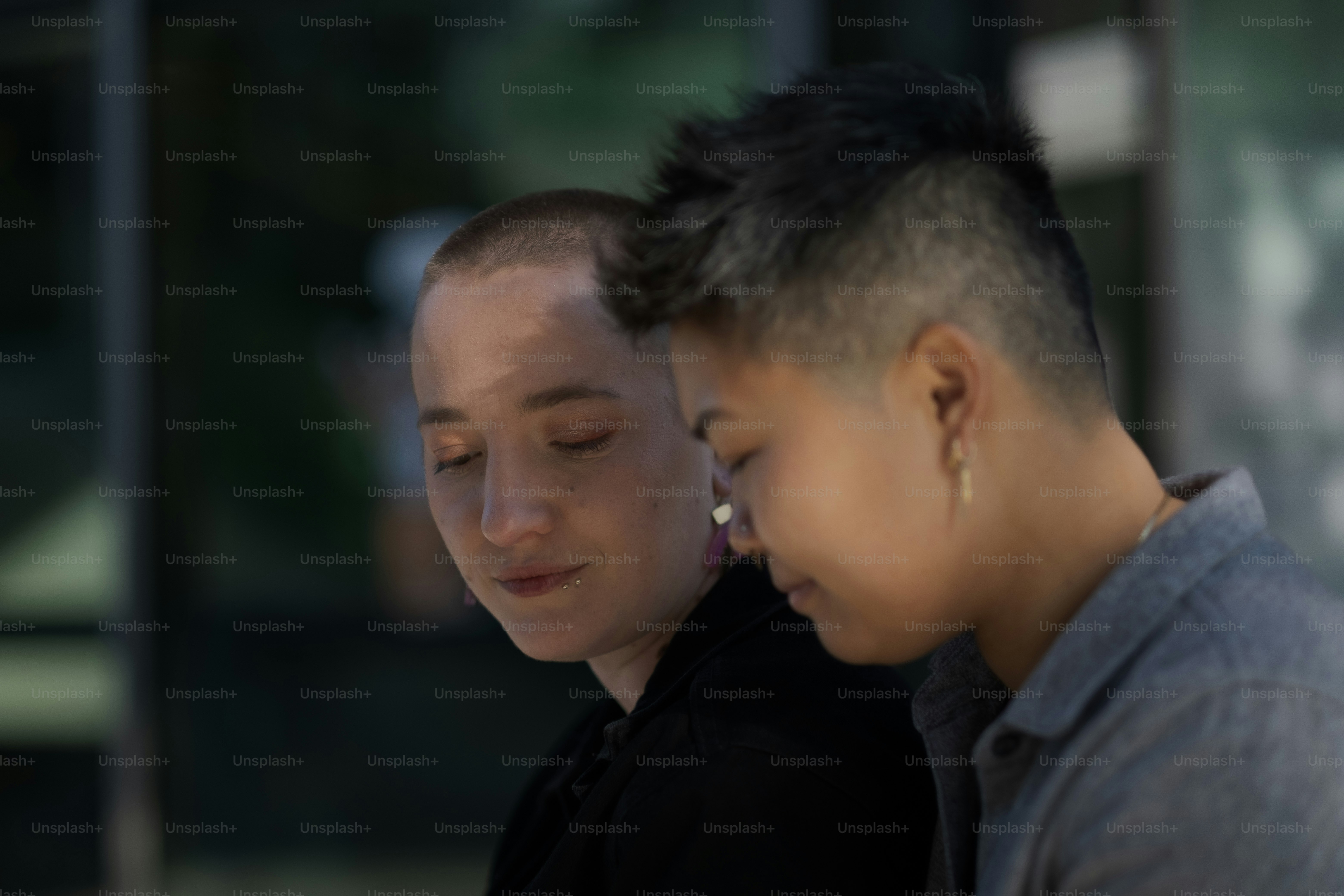 J. (they/them, Chinese American) and M. (they/them, White American), a nonbinary and interracial couple, expressing their love for each other on an outing in California.