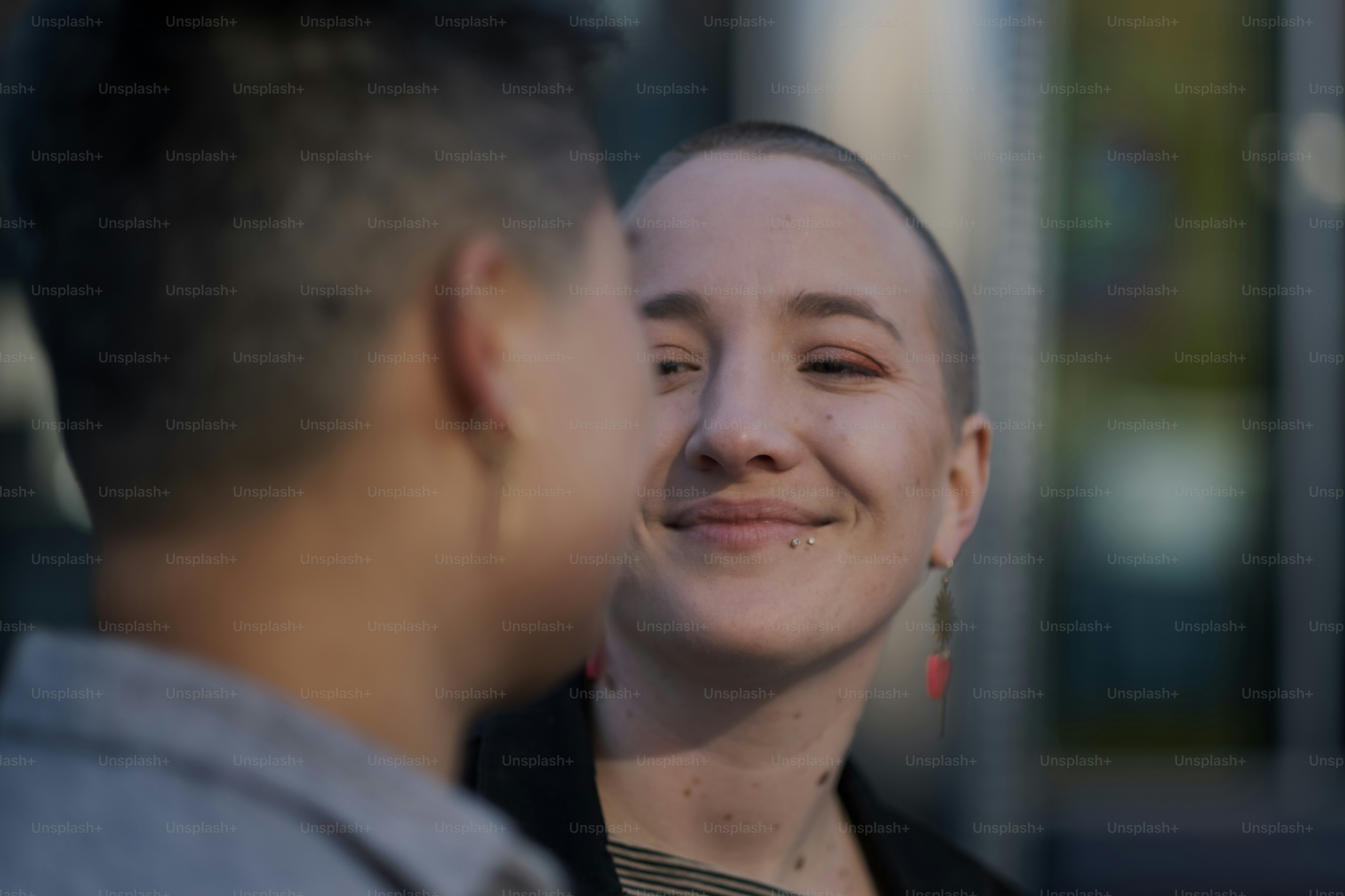 a man and a woman standing next to each other