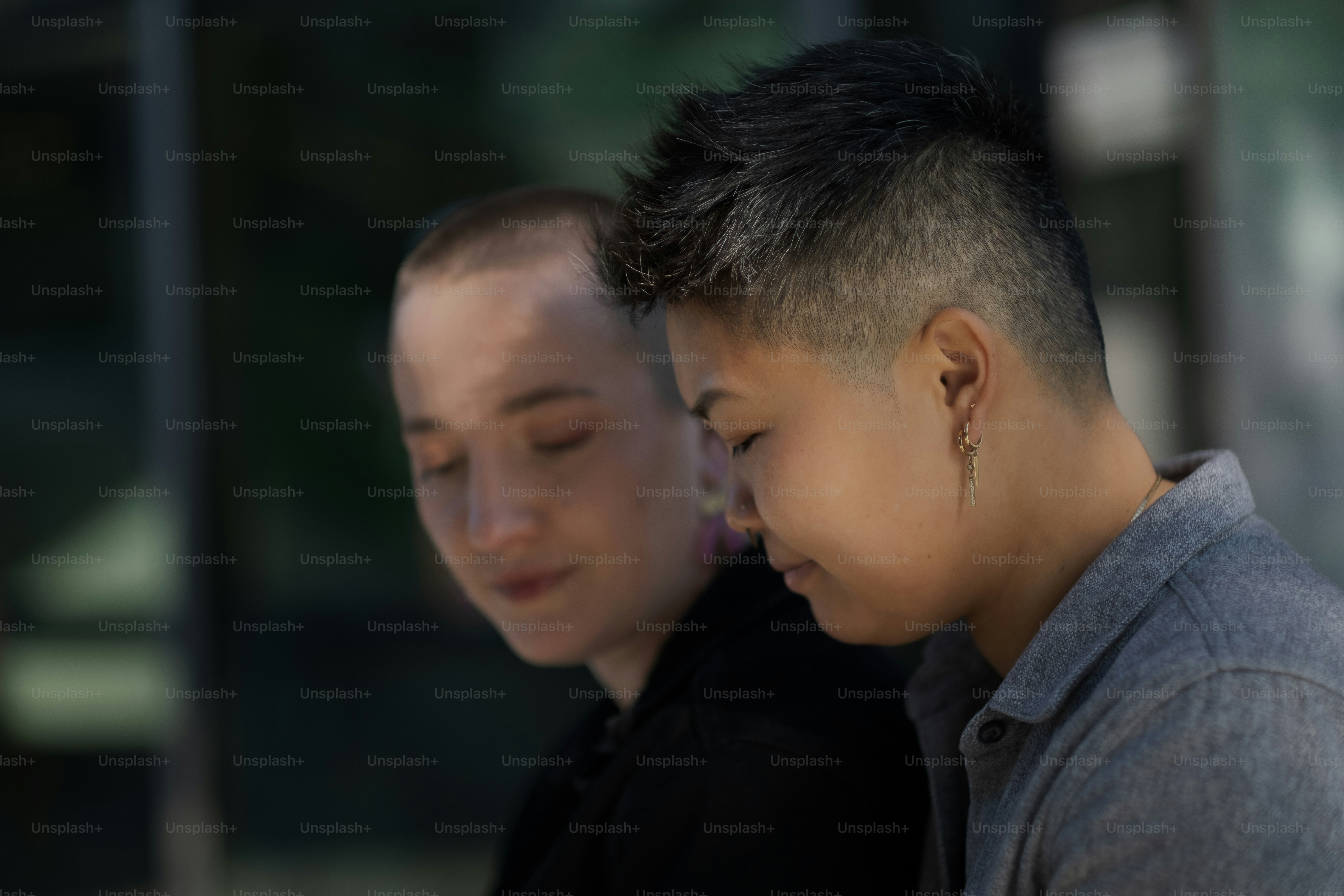 J. (they/them, Chinese American) and M. (they/them, White American), a nonbinary and interracial couple, expressing their love for each other on an outing in California.