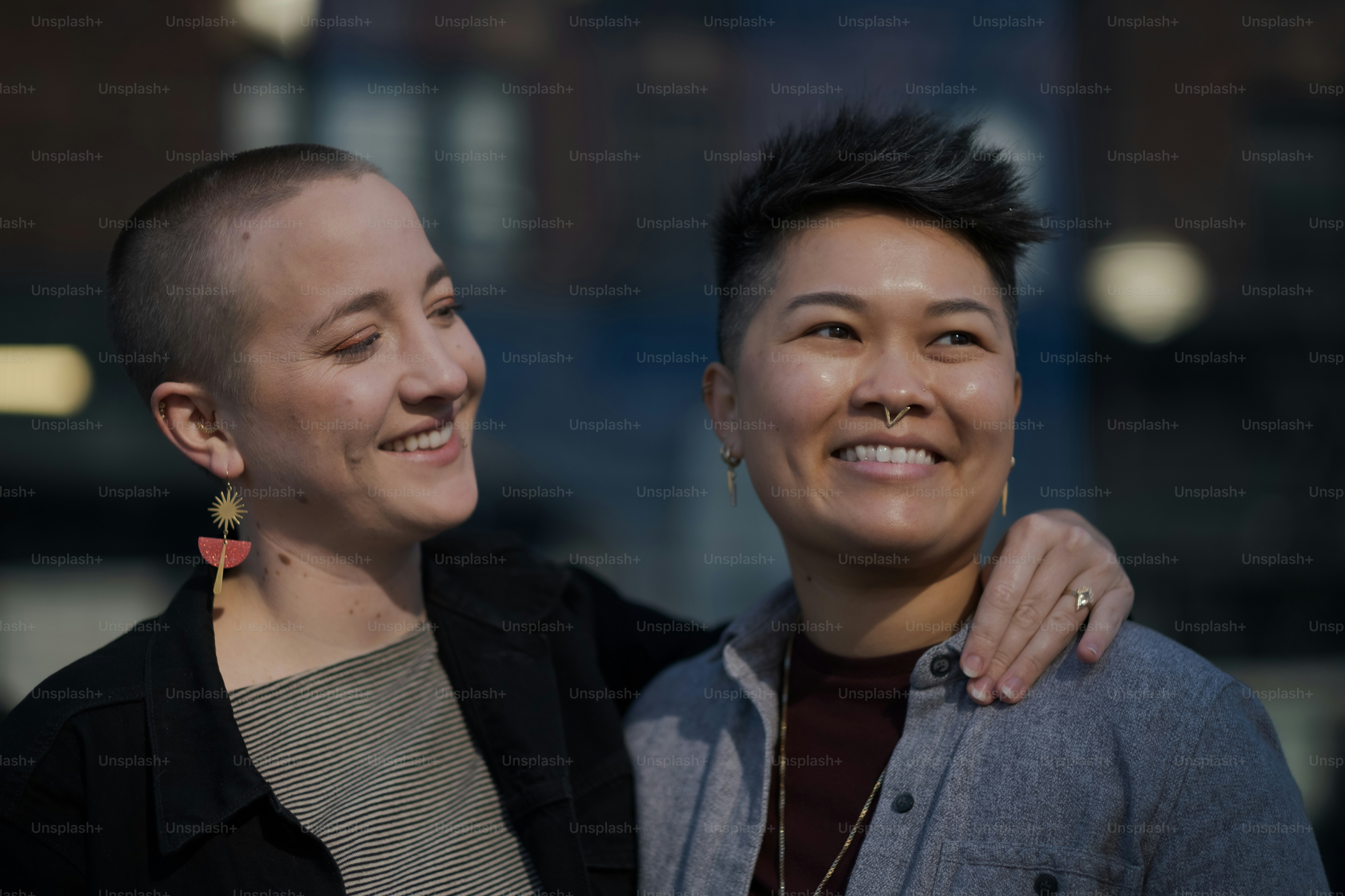 a couple of women standing next to each other