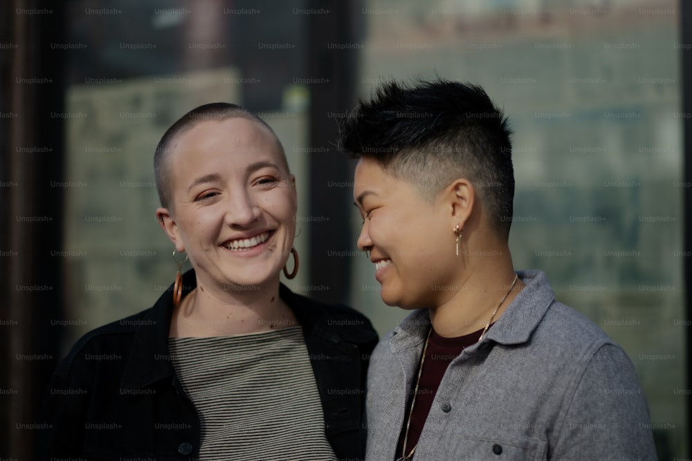 a man and a woman standing next to each other