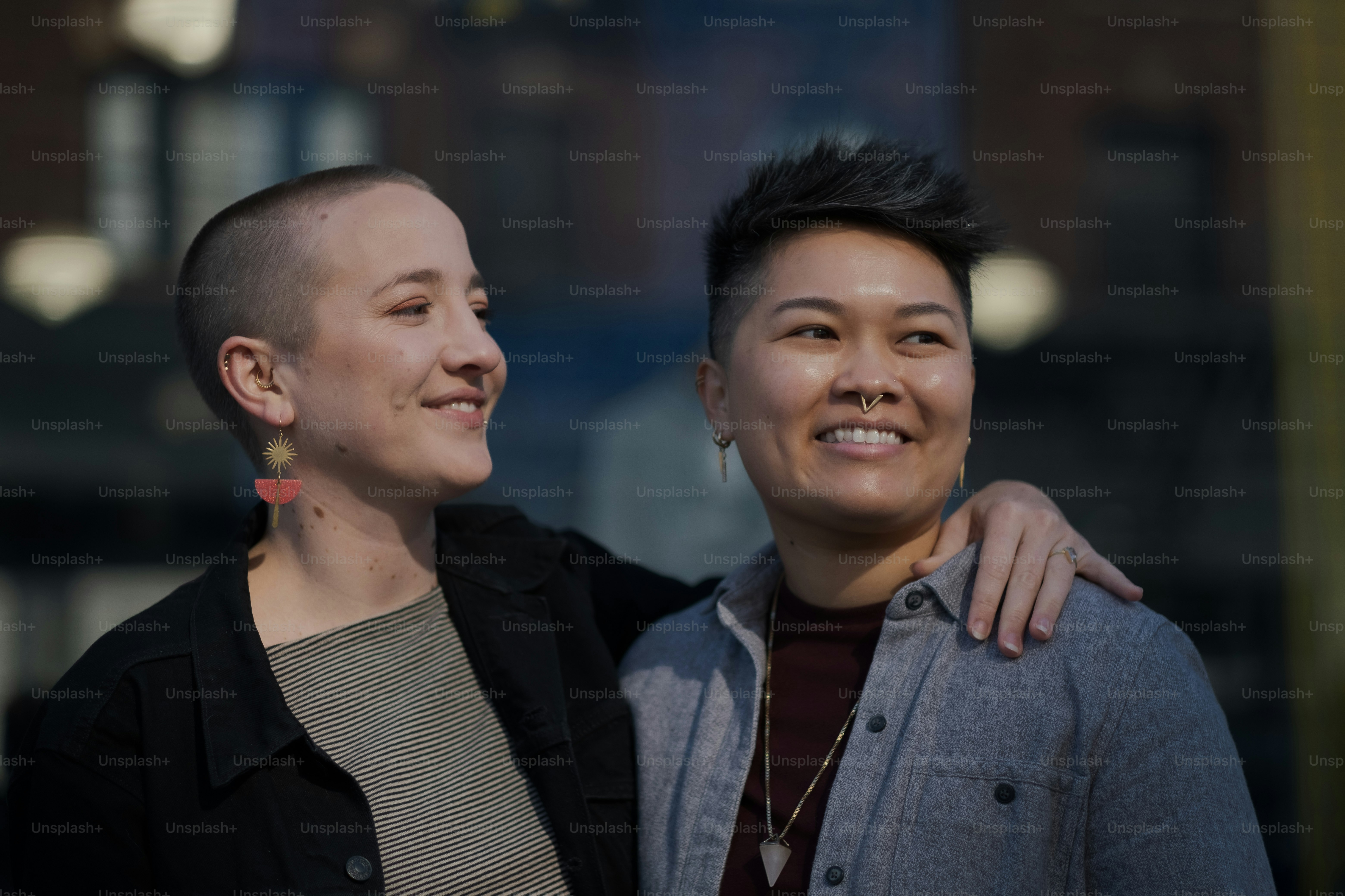 a couple of women standing next to each other