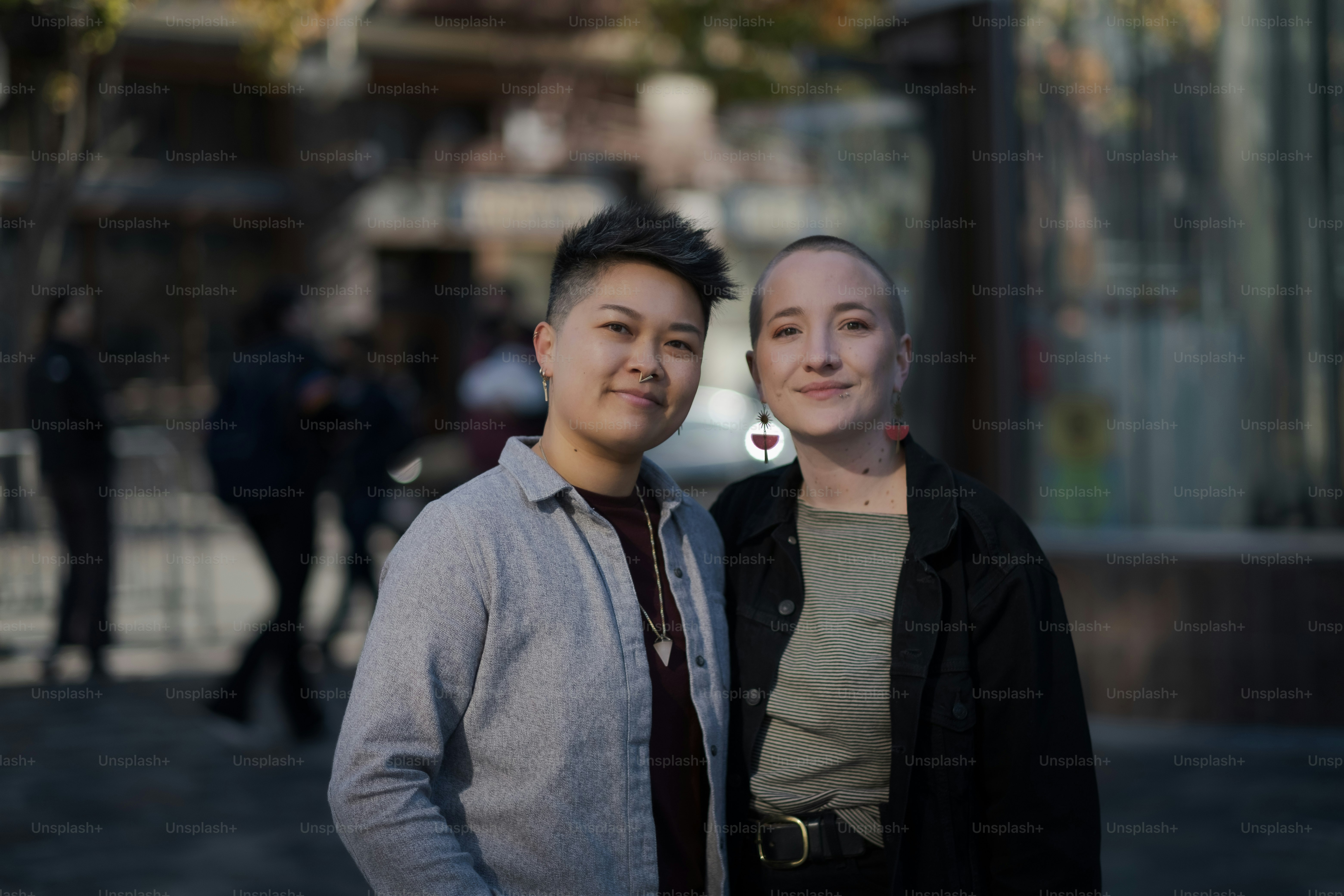 a couple of people standing next to each other