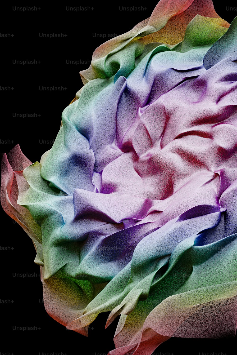a close up of a colorful flower on a black background