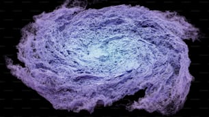 a blue and purple swirl on a black background