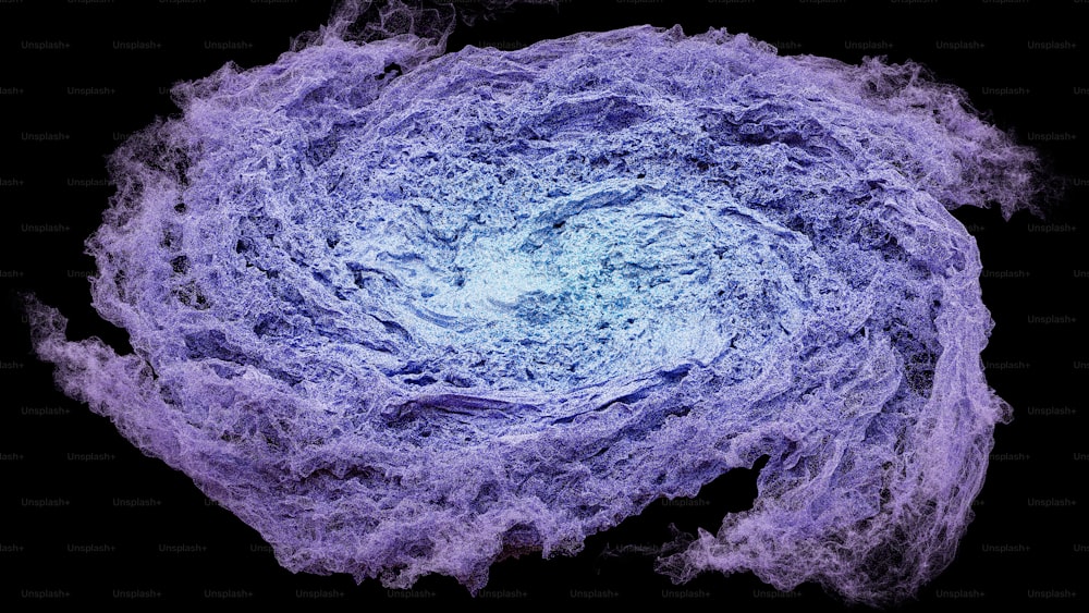 a blue and purple swirl on a black background