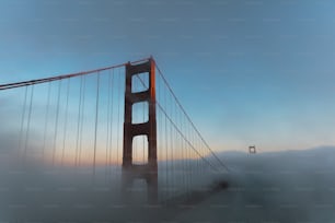 a foggy view of the golden gate bridge