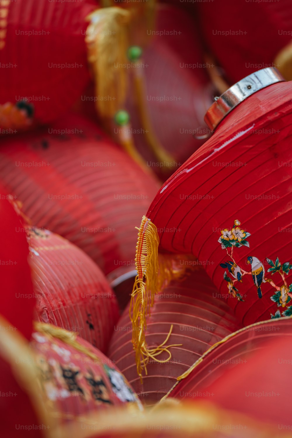 a bunch of red paper lanterns sitting on top of each other