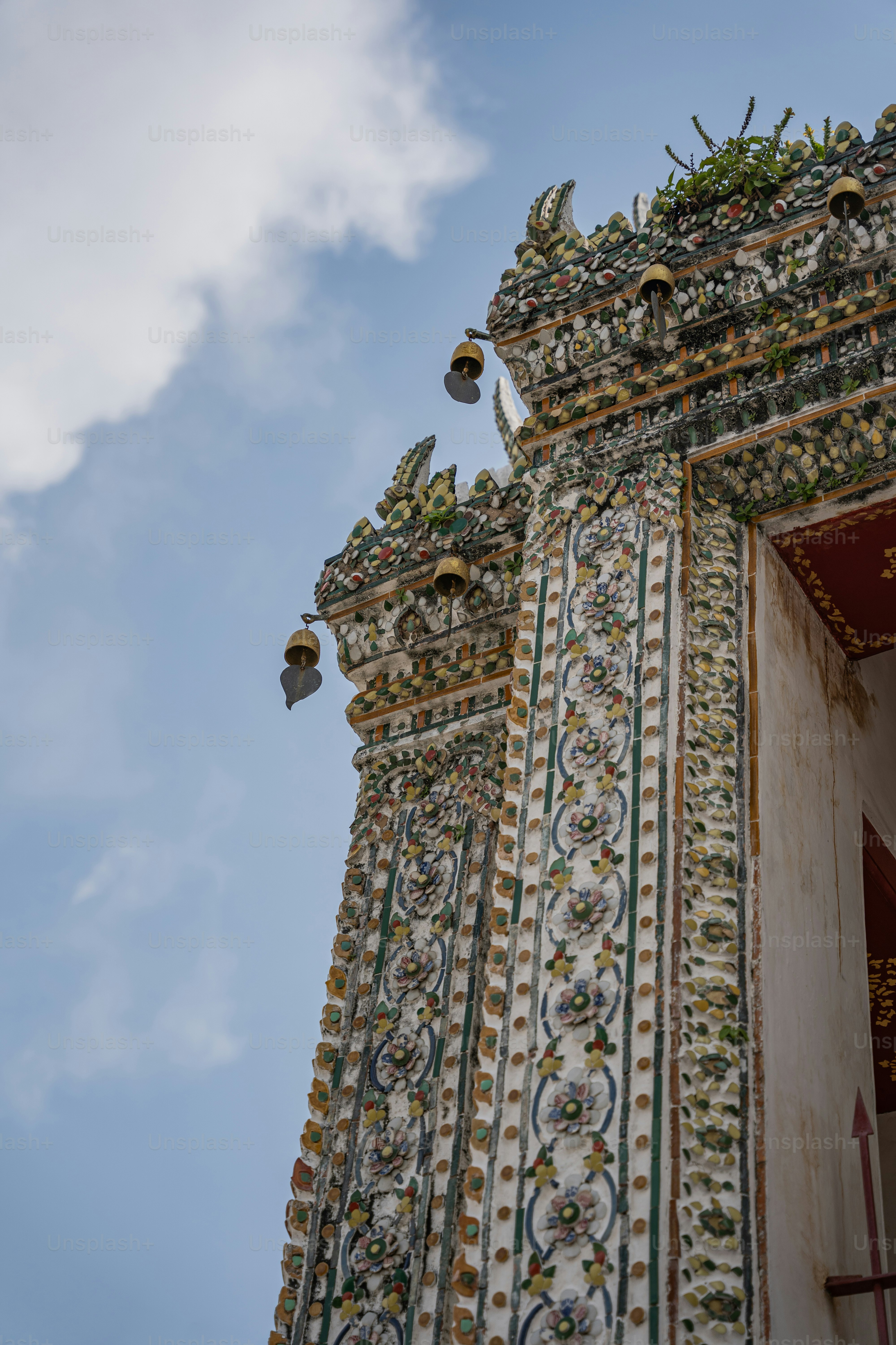 a tall building with a clock on the side of it