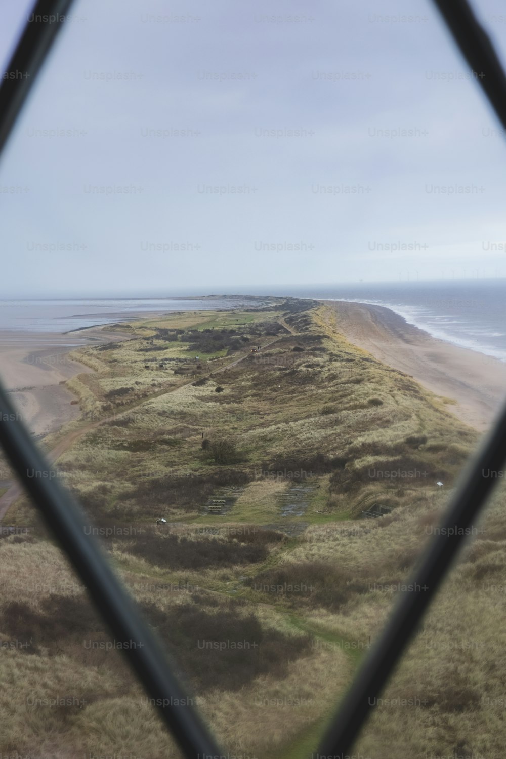 a view of a beach through a window