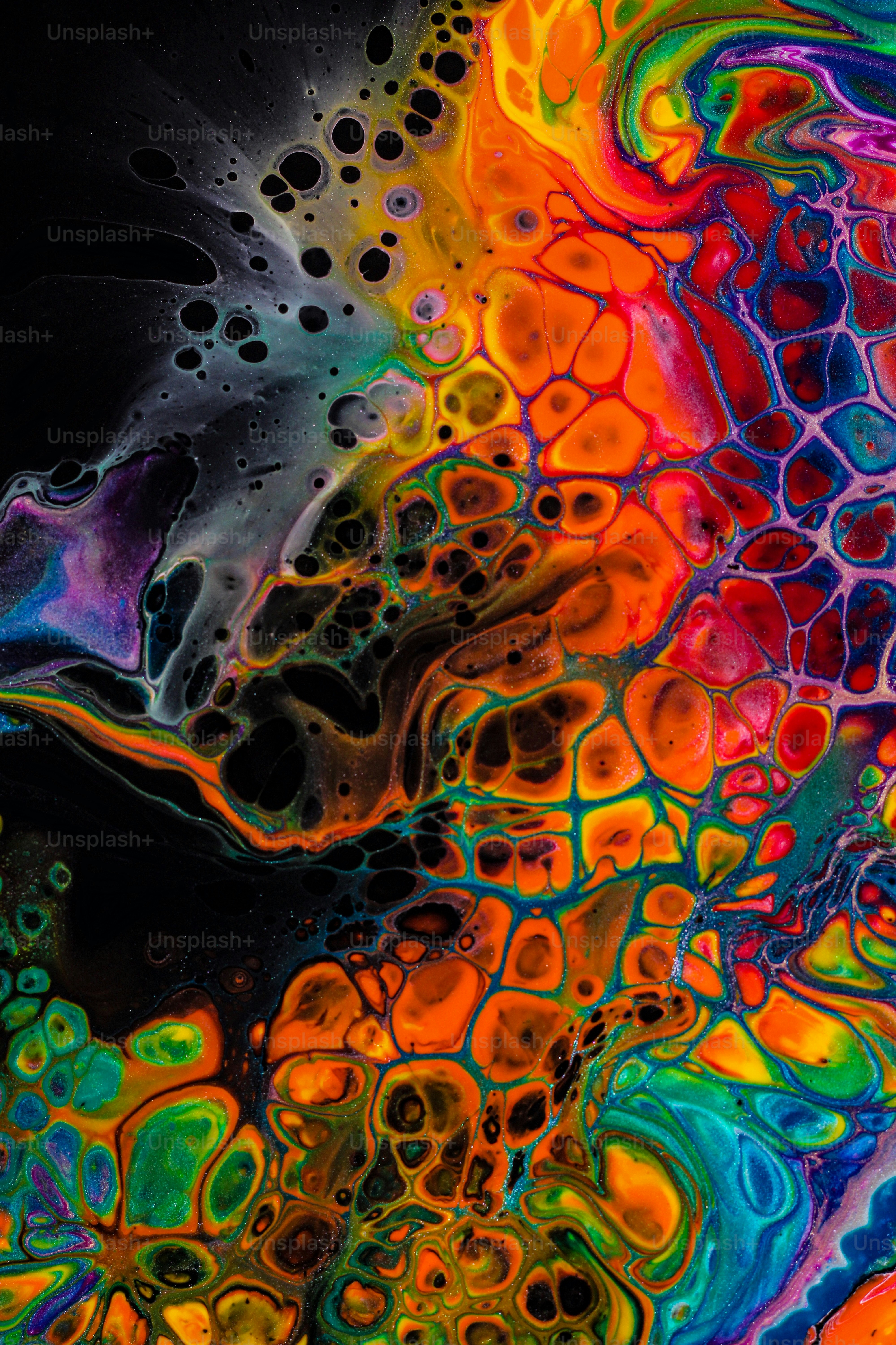 a close up of a colorful liquid substance