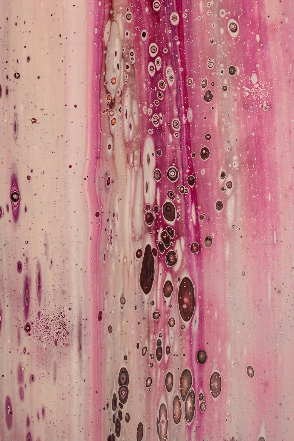 a close up of a painting with water drops