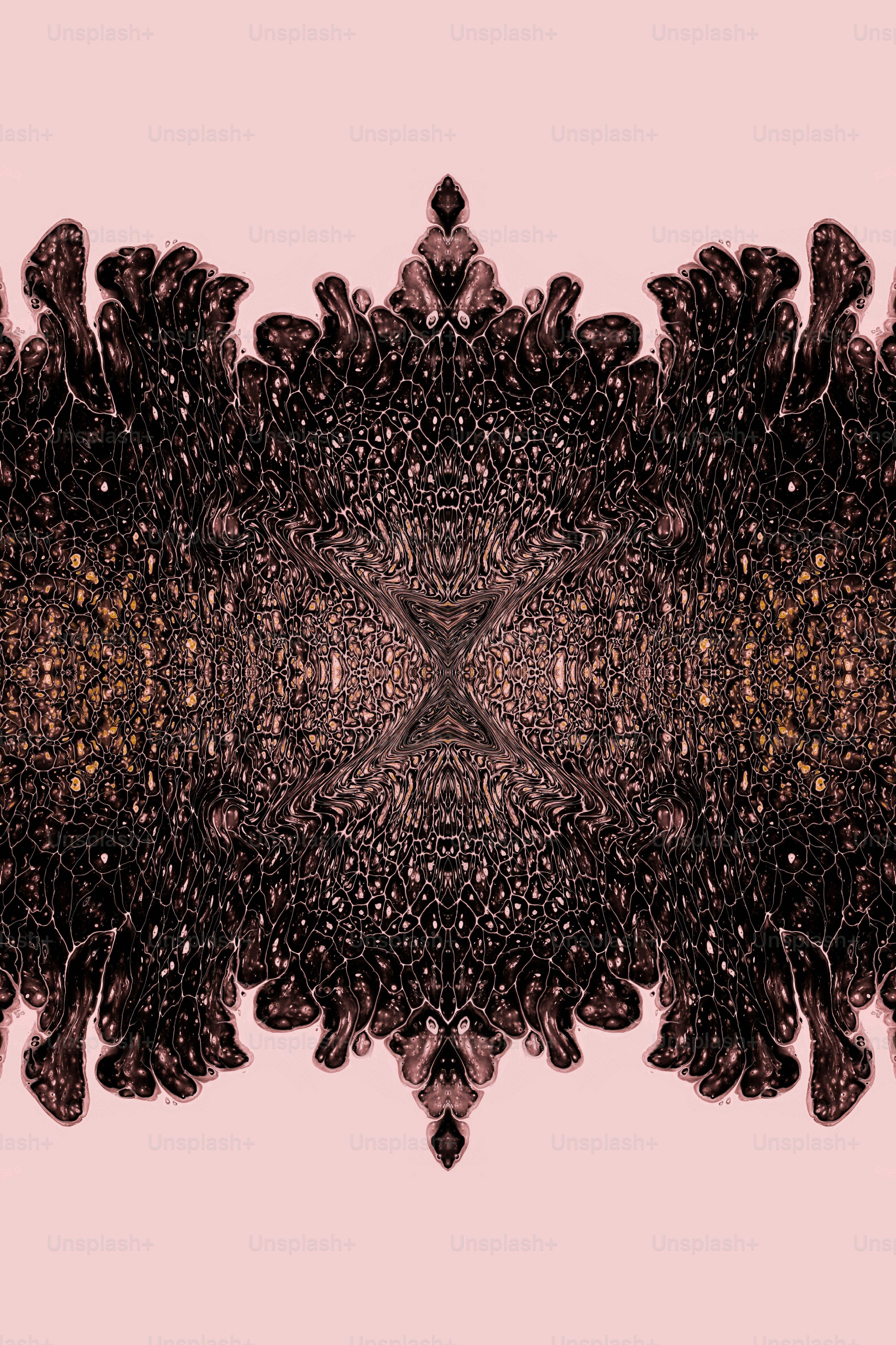 a pink background with a black and gold design