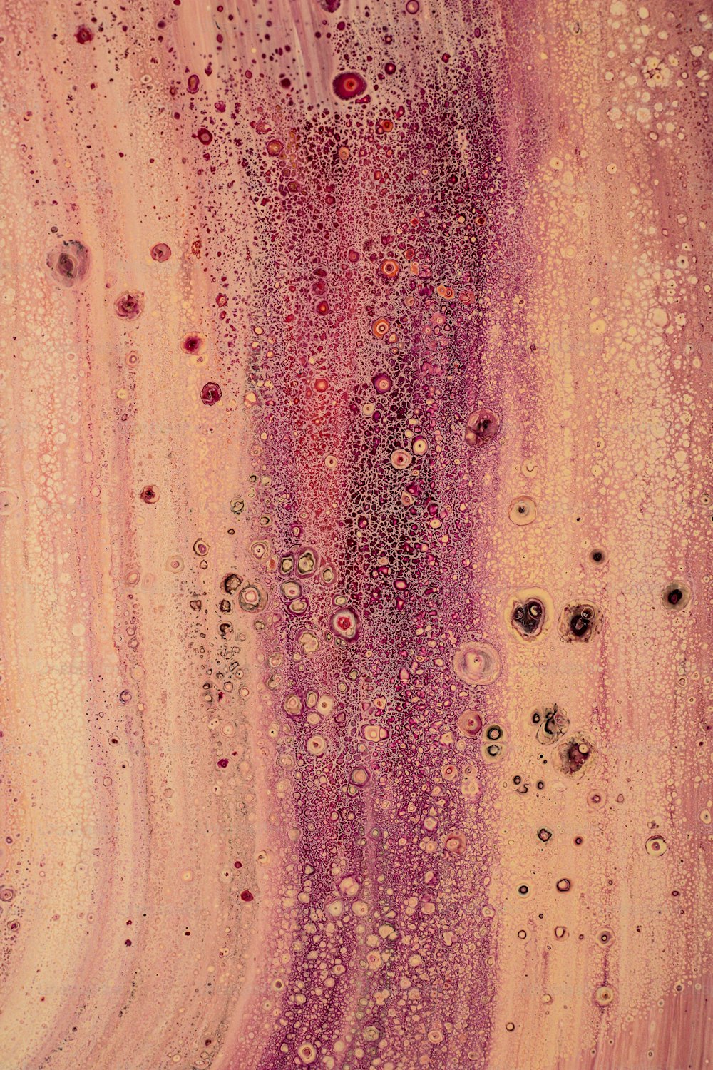 a close up of a pink and purple substance