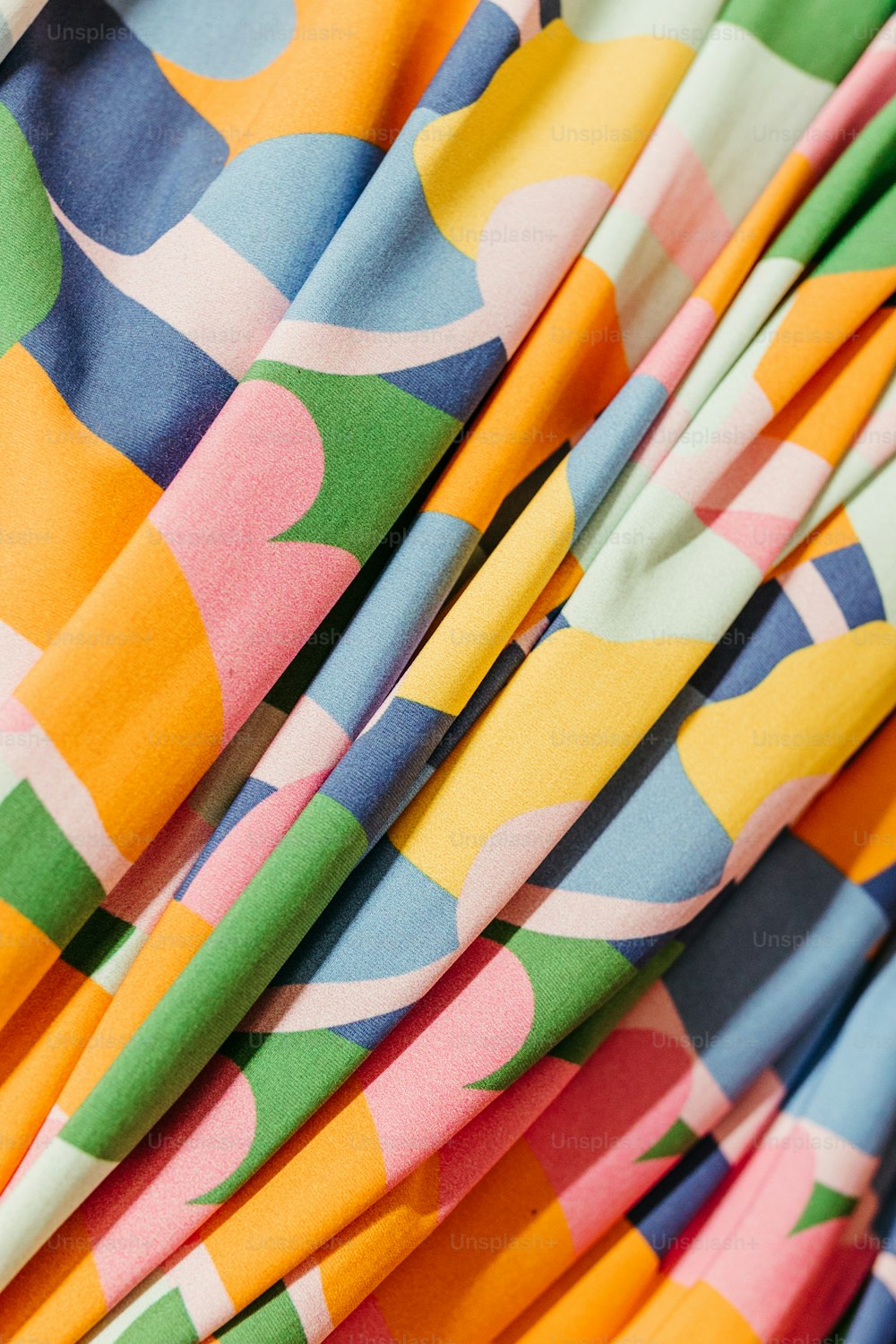 a close up of a colorful dress with a pattern on it