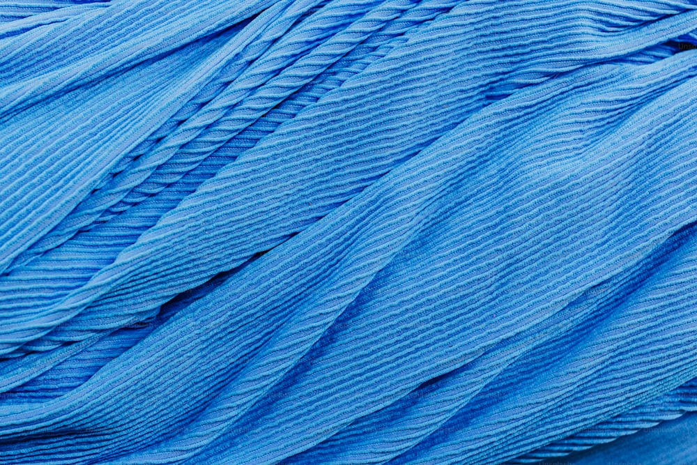 a close up of a blue cloth texture