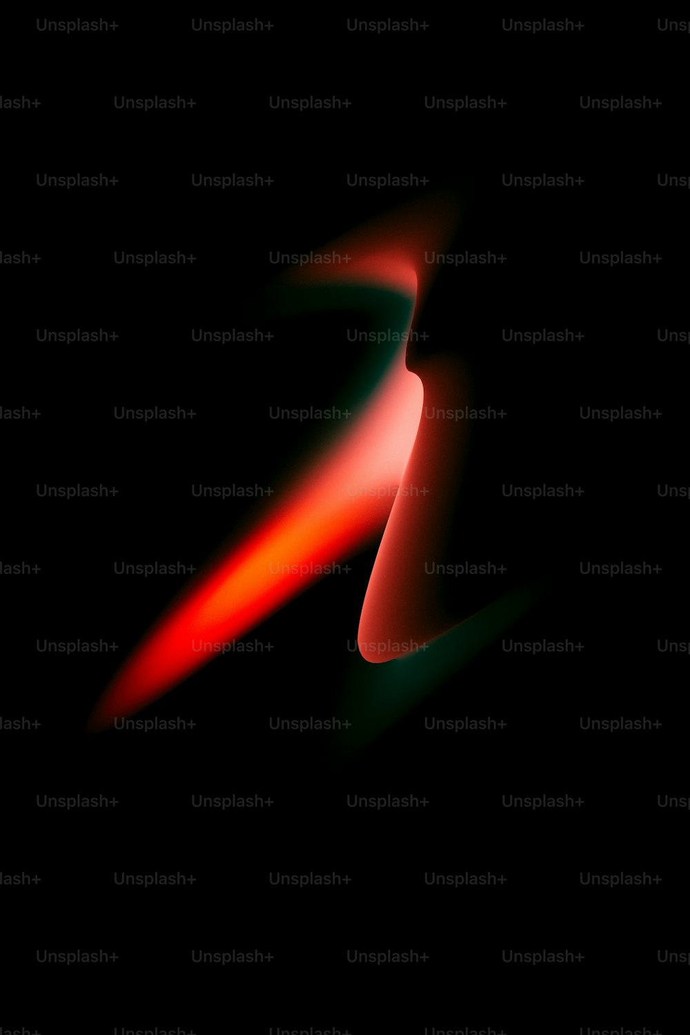 a black background with a red and green swirl