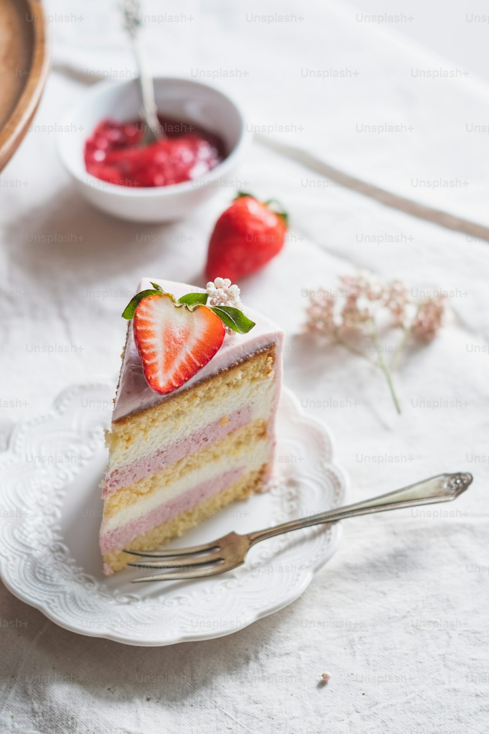 a piece of cake on a plate with a fork