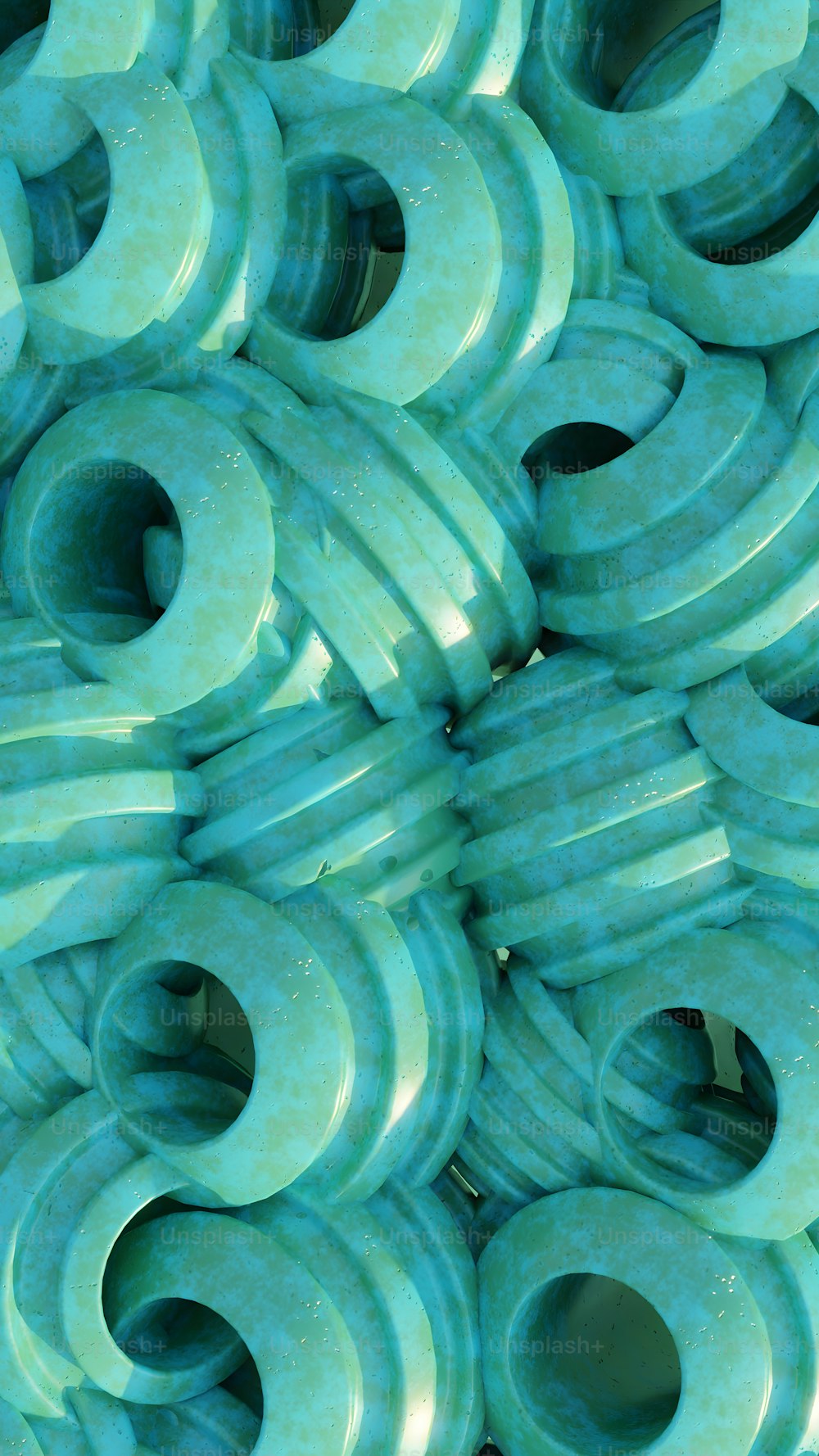 a close up of a bunch of green donuts
