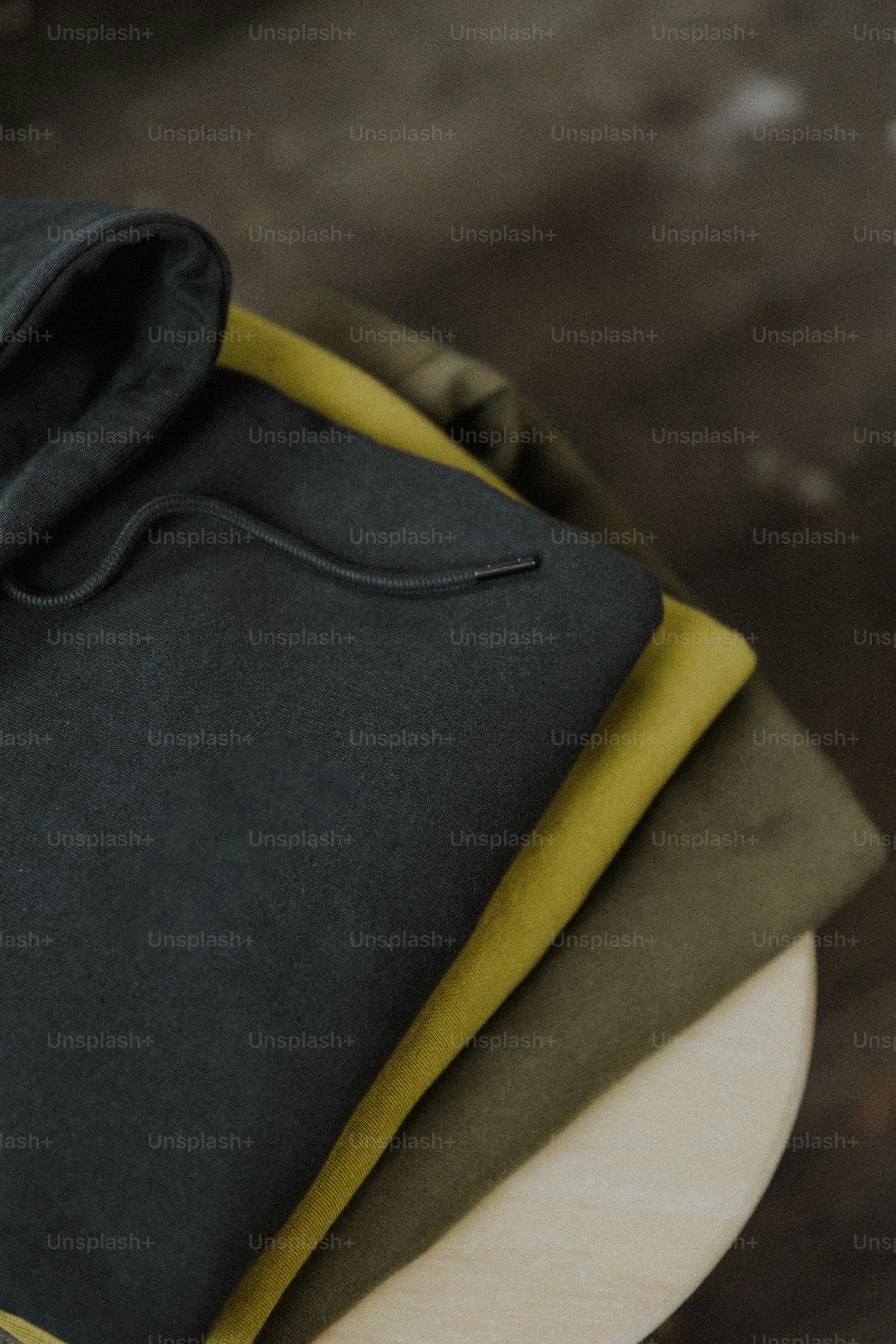 a close up of a black shirt on a table