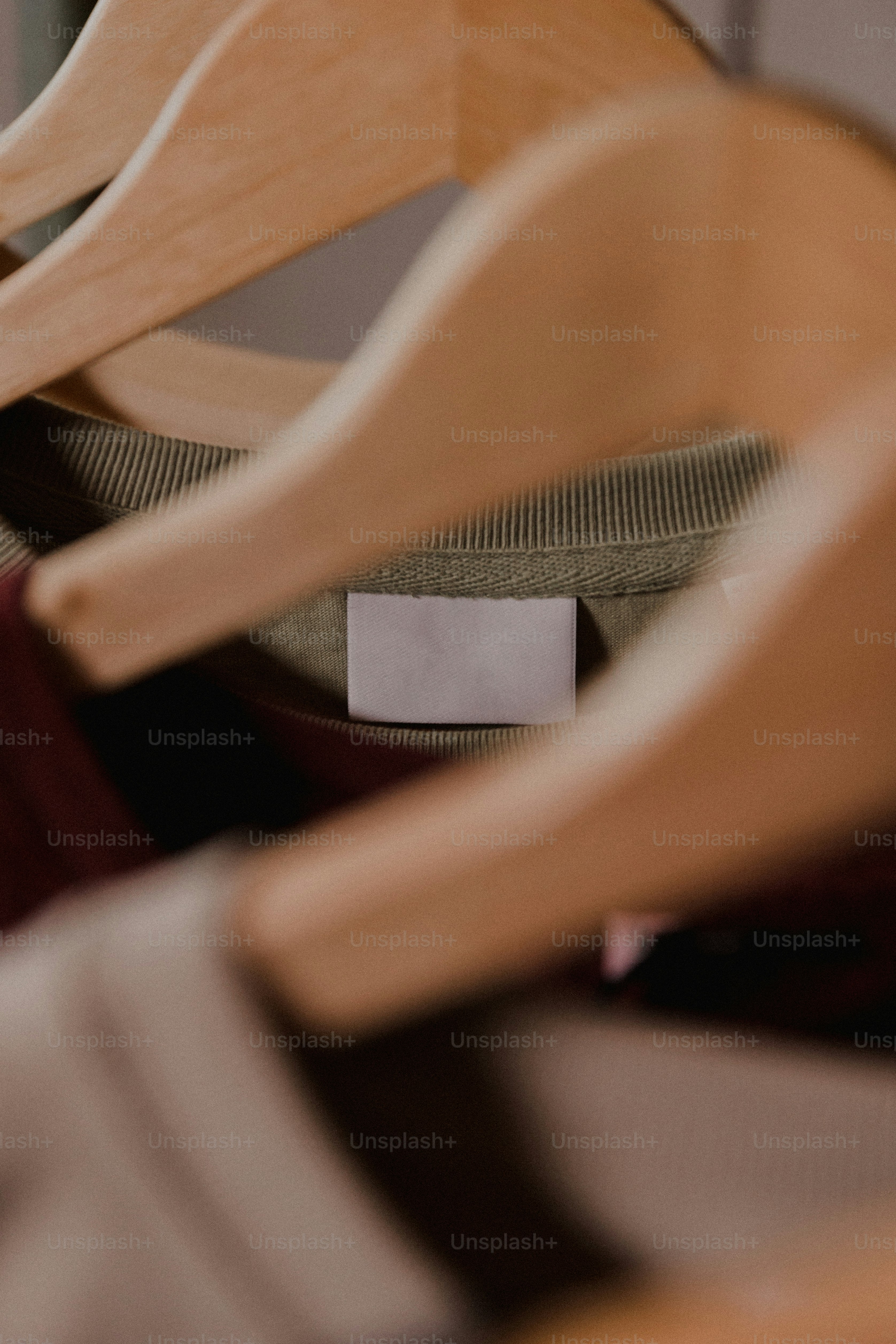 a row of wooden chairs sitting next to each other
