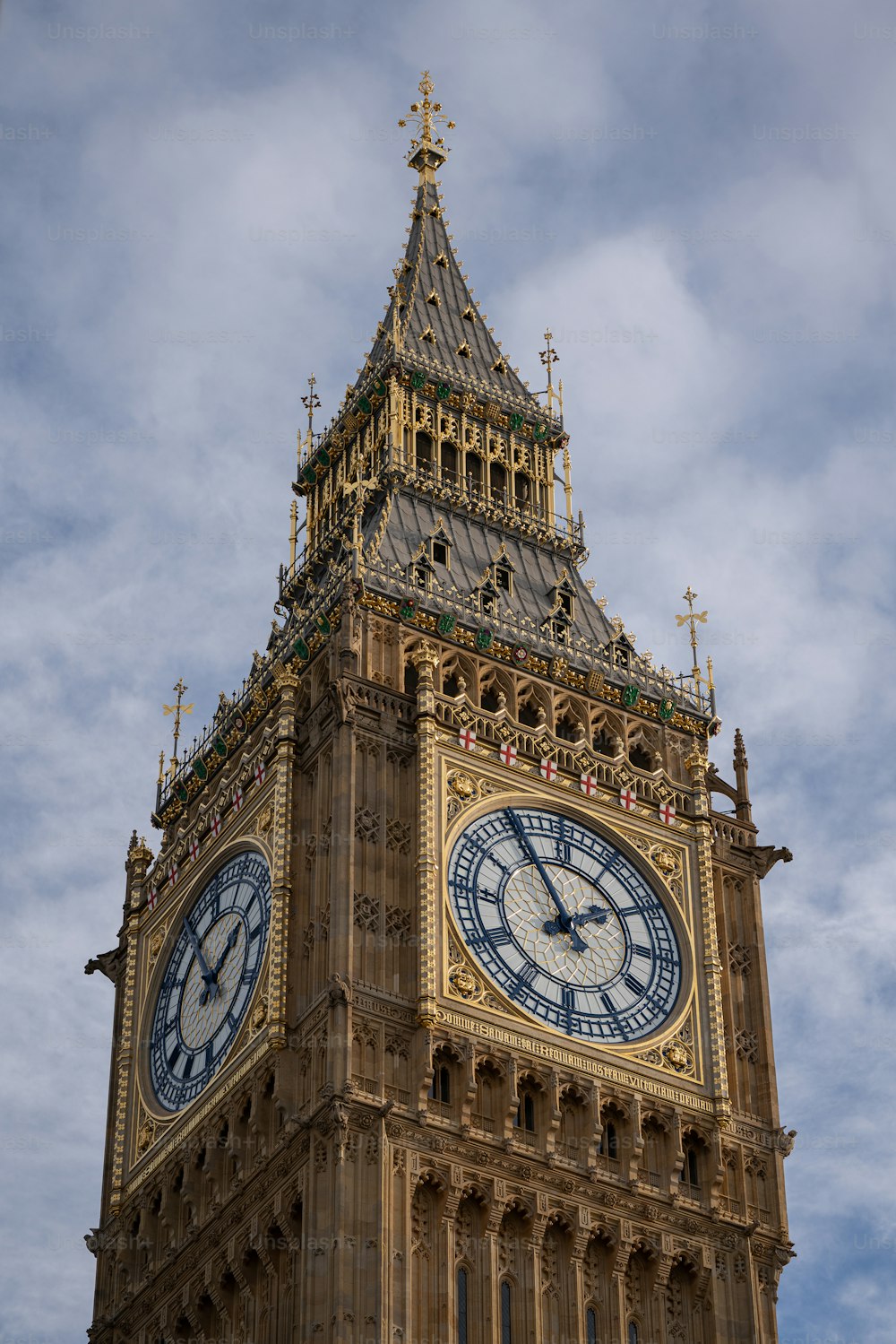 a tall clock tower with a sky background