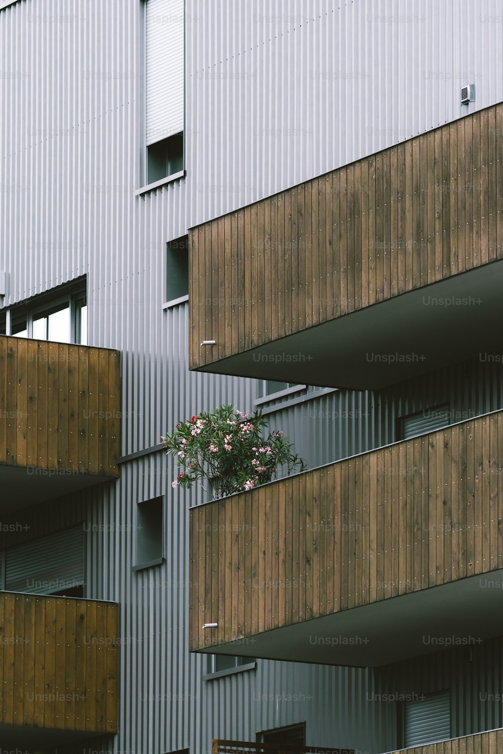 a tall building with balconies and a balcony