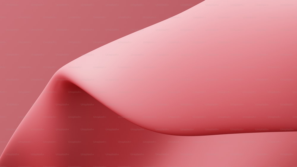 a close up view of a pink background