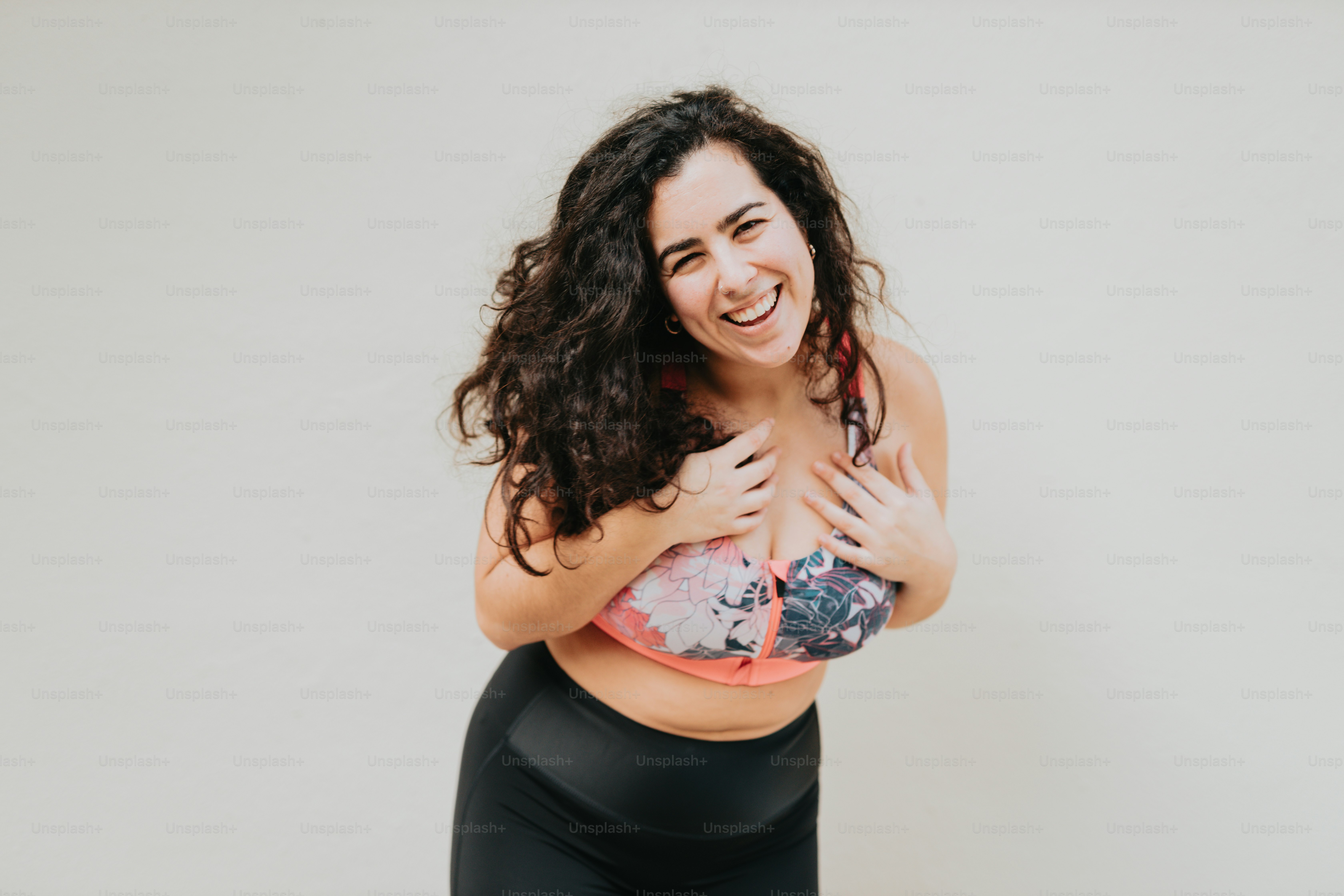 a woman in a sports bra top and leggings