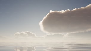 a large cloud is in the sky above the water