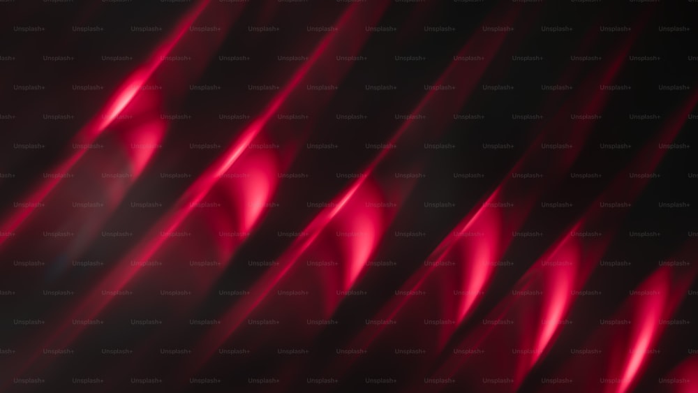 ein schwarz-roter Hintergrund mit einigen roten Lichtern