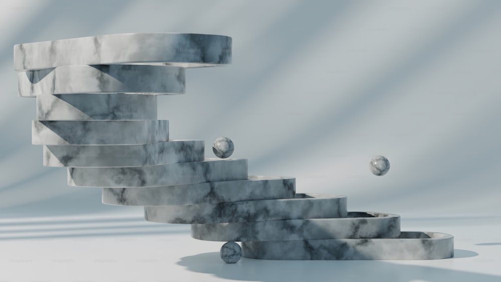a spiral staircase made of marble on a white background