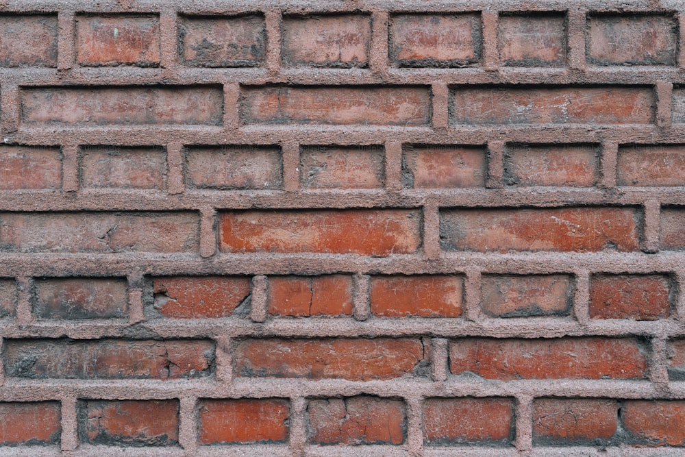 a close up of a brick wall made of bricks