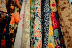 a close up of a bunch of ties on a rack