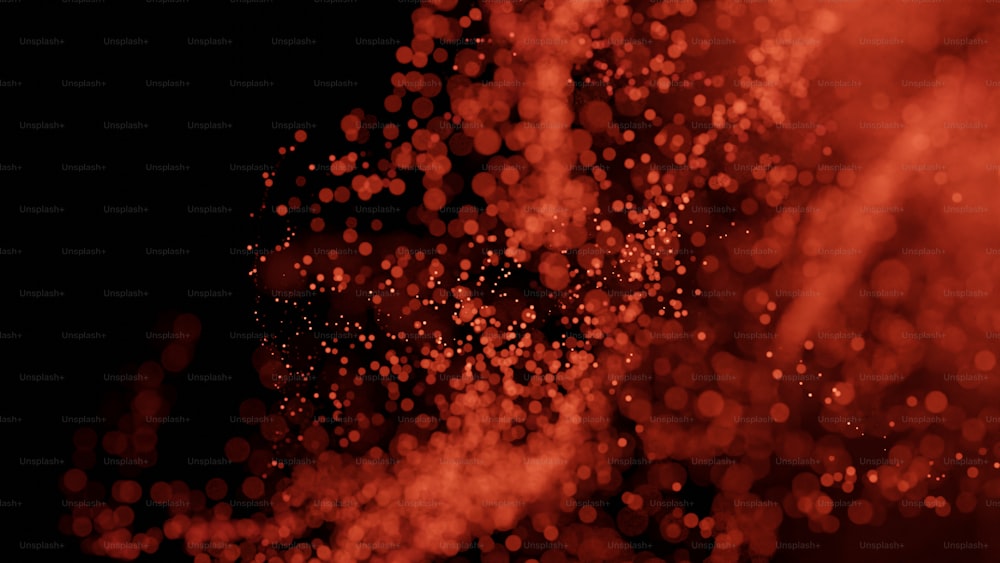 uma imagem desfocada de luzes vermelhas em um fundo preto