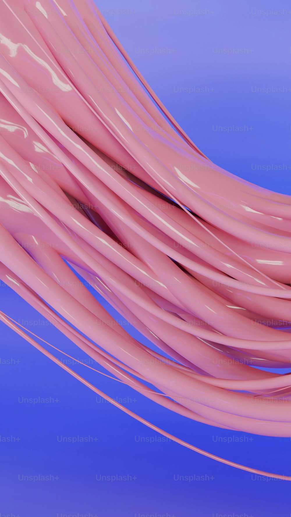 um close up de um objeto rosa em um fundo azul