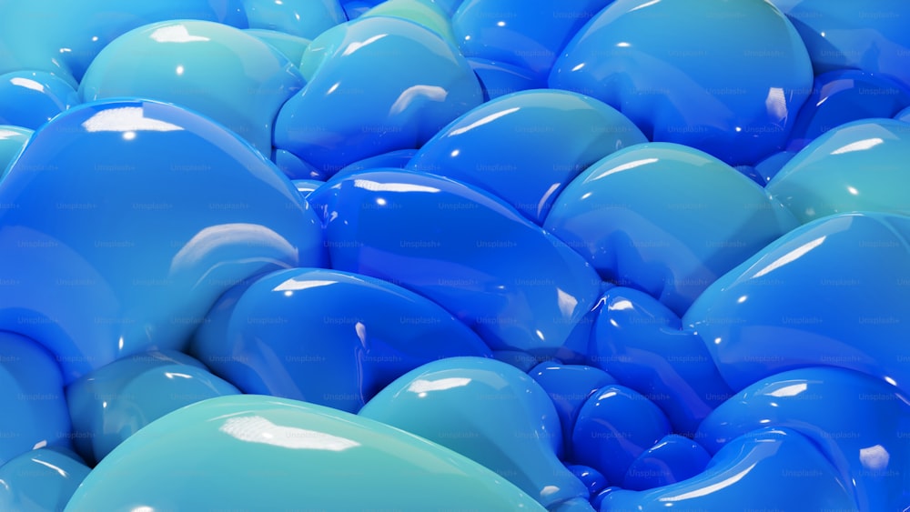 eine große Gruppe blauer und grüner Luftballons