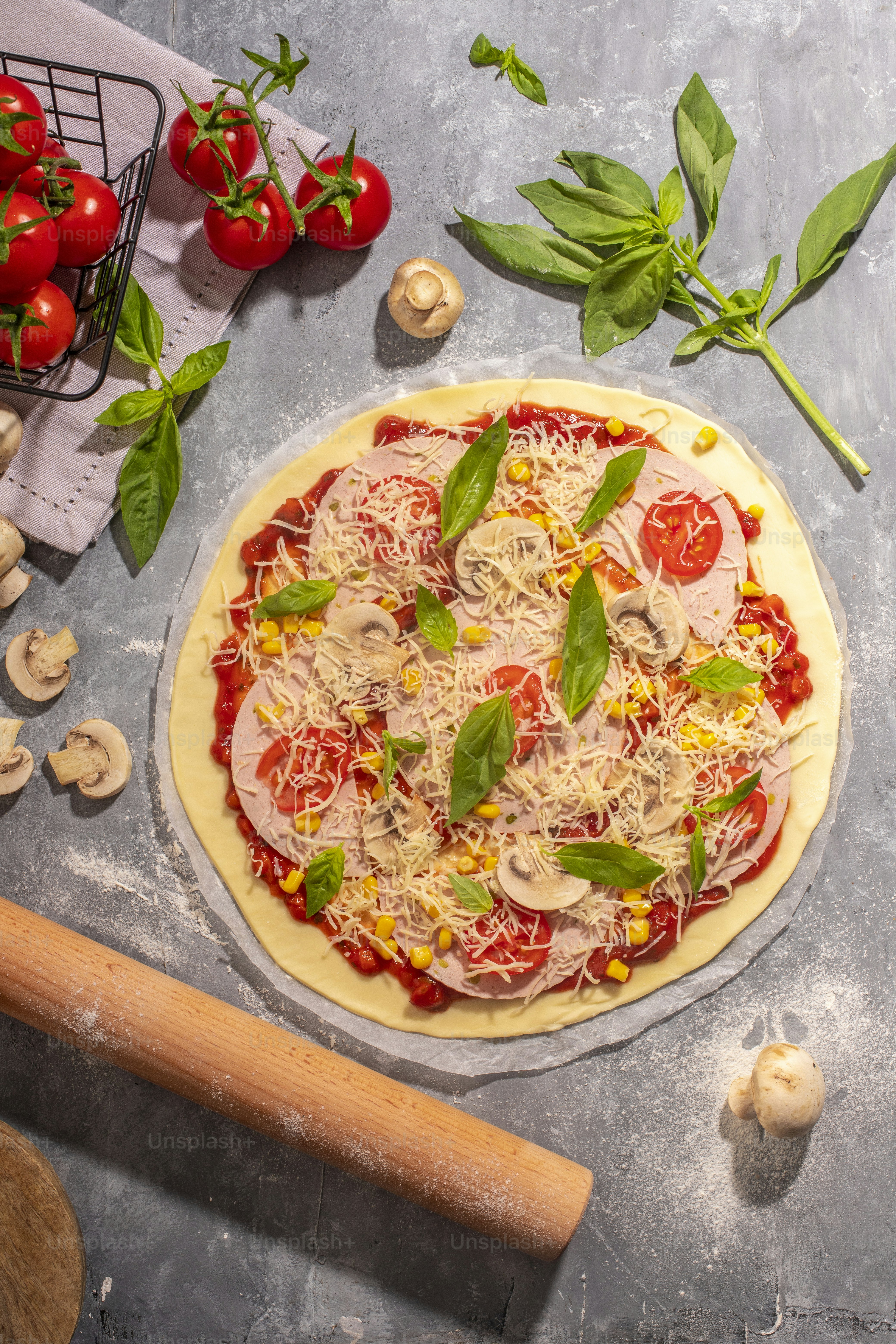 Home cook stretching dough for Italian pizza recipes with crispy crust preparation
