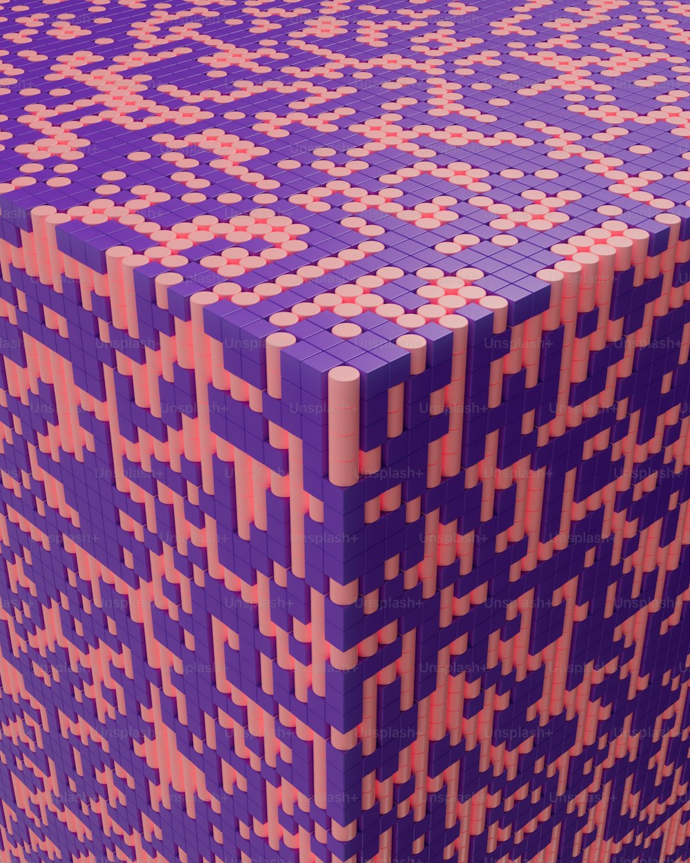uma caixa roxa e laranja com um padrão sobre ela