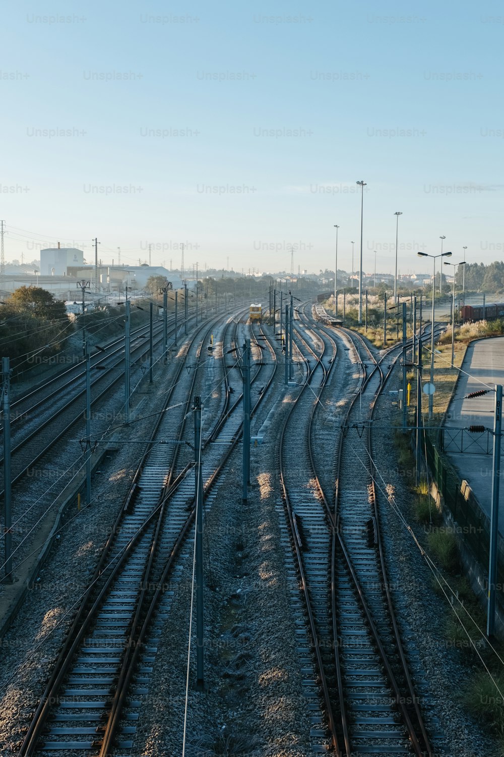 a view of a train yard with many tracks