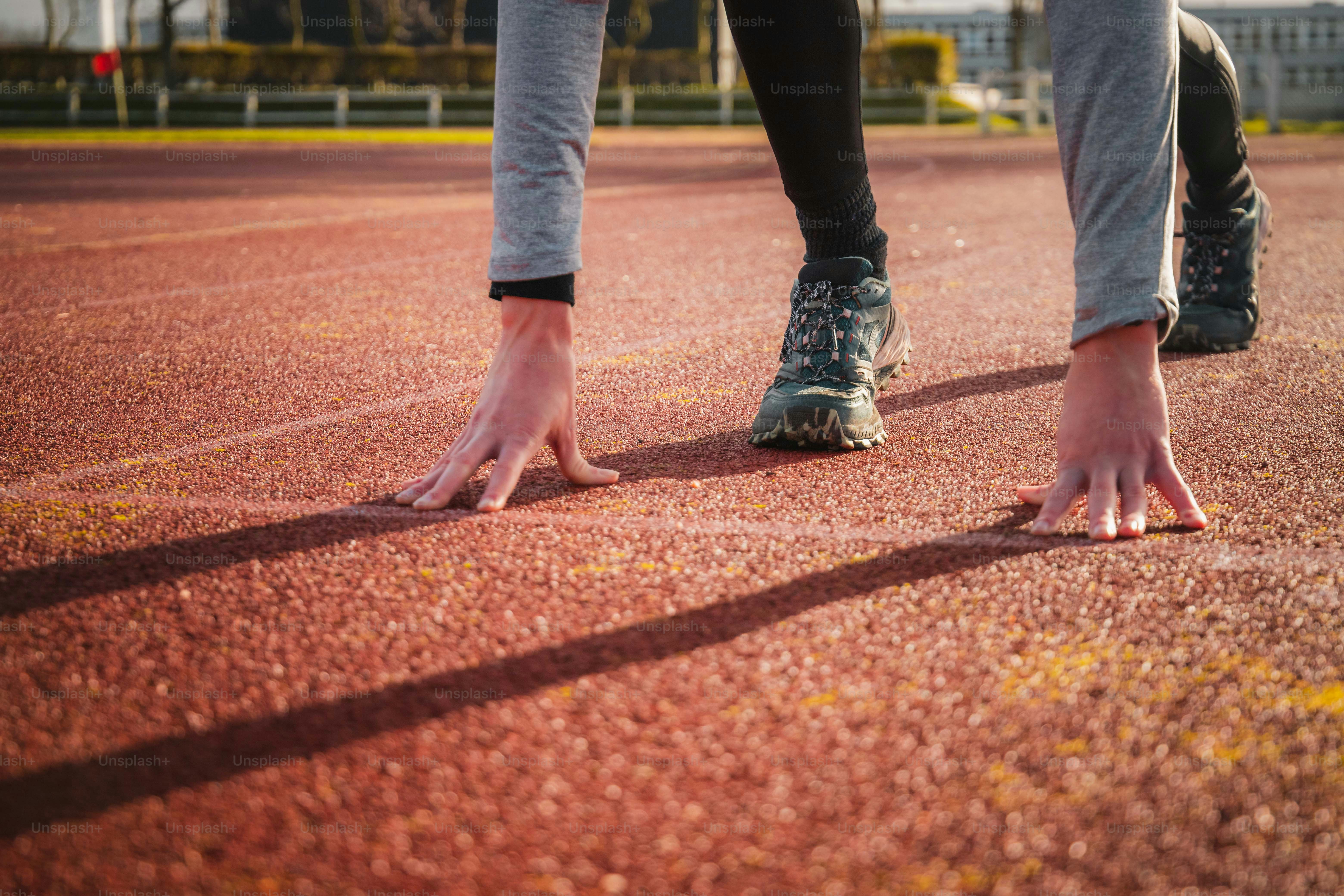 a couple of people standing on top of a tennis court