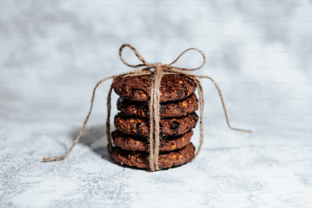 a stack of cookies wrapped in twine