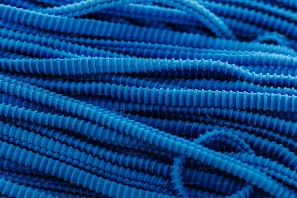 a close up shot of a blue fabric