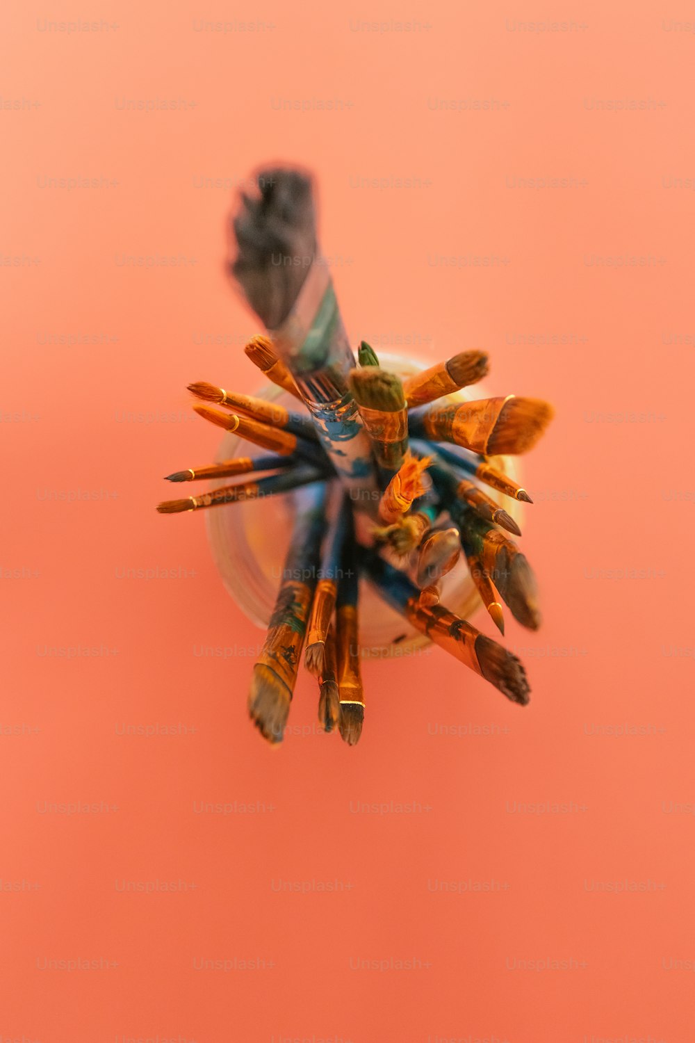 a bunch of pencils sitting on top of a white plate