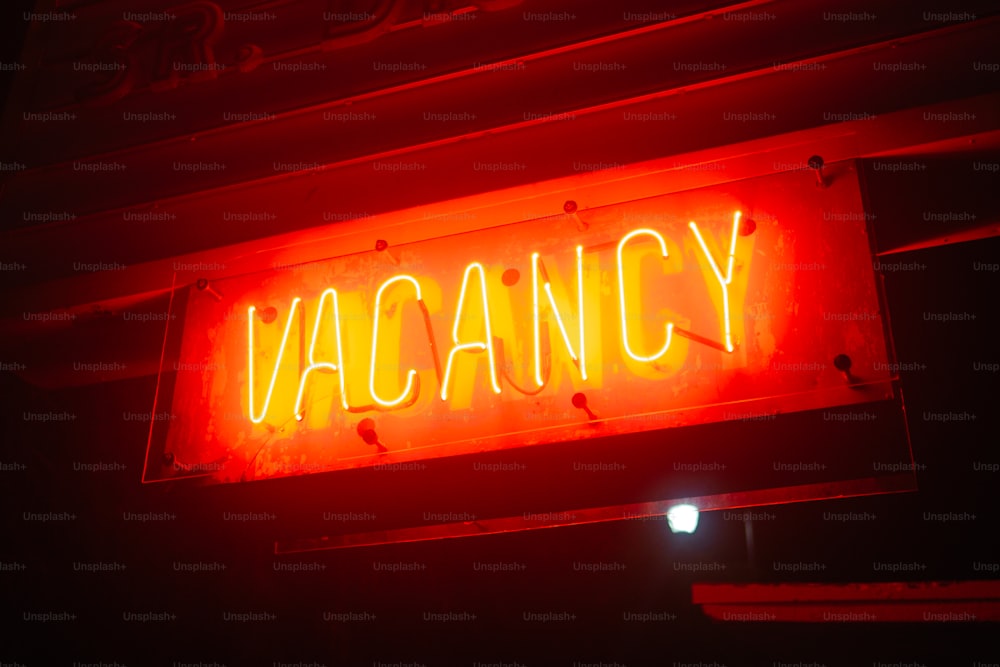 a neon sign that says vacancy on it