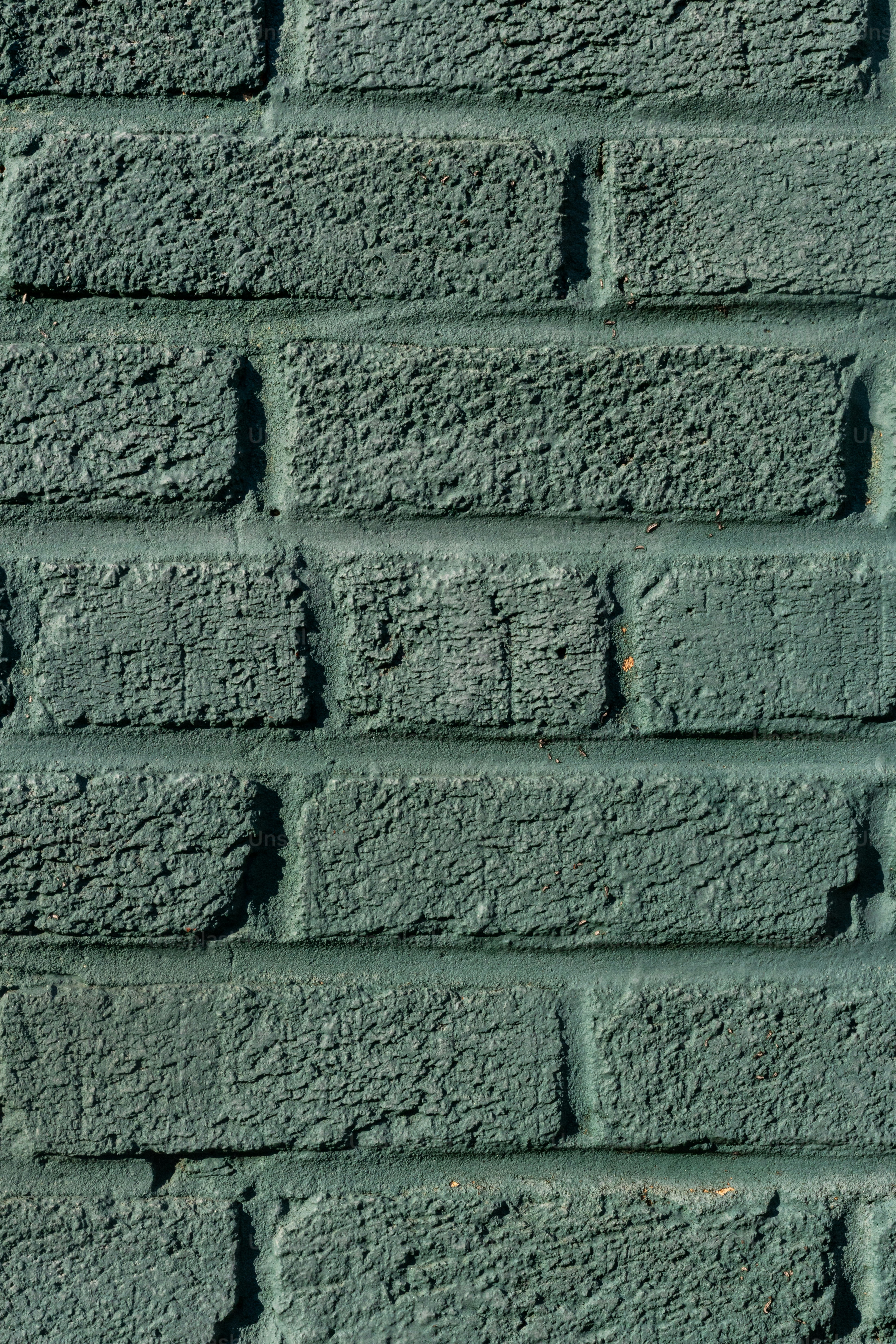 A close up of a wall made of bricks photo Brick wall background Image