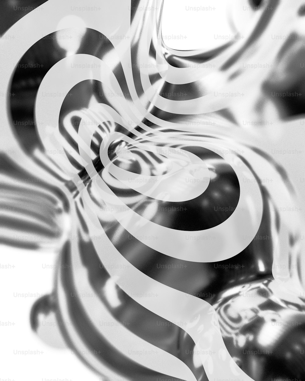 uma foto em preto e branco de um desenho em espiral