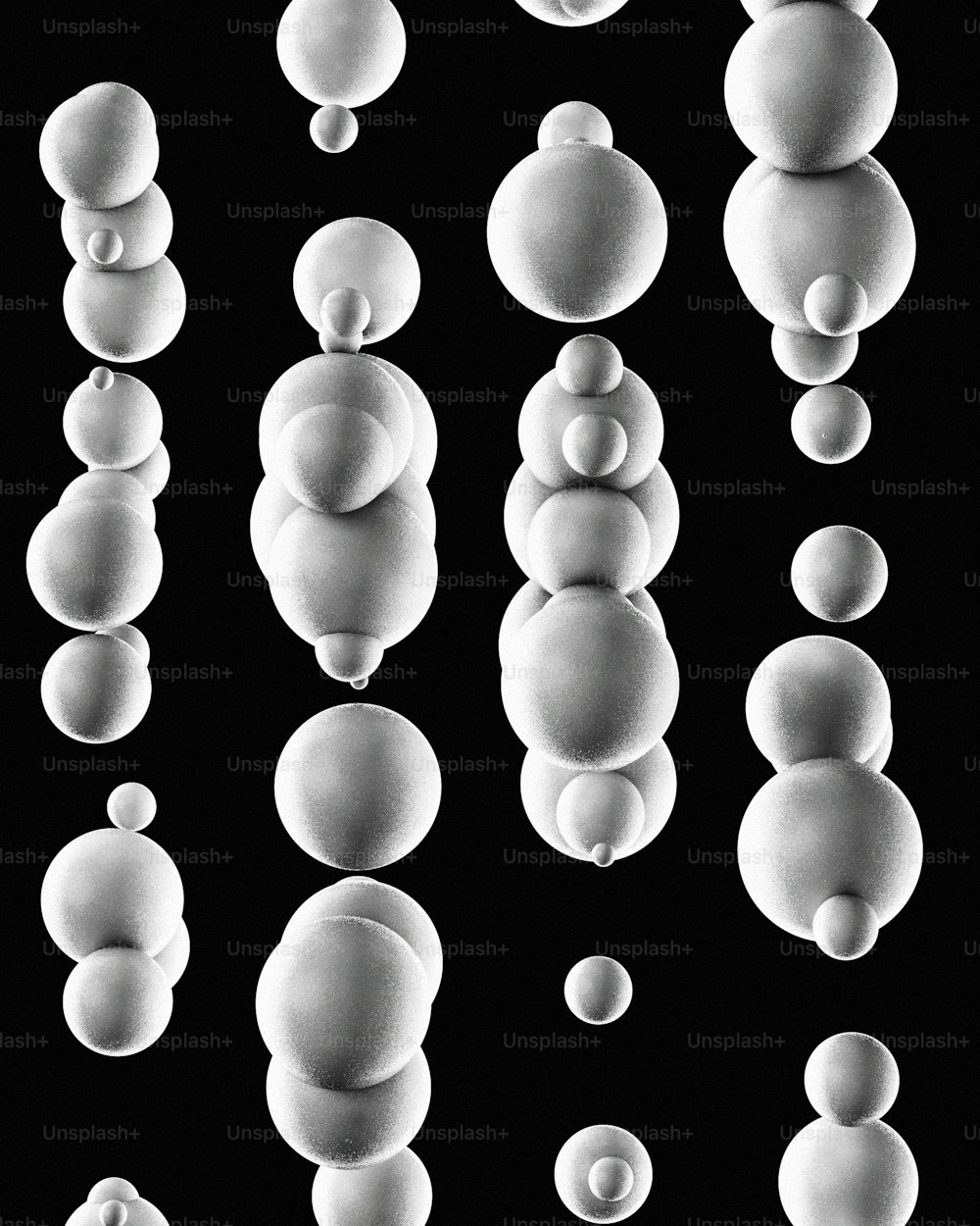 a black and white photo of a bunch of bubbles